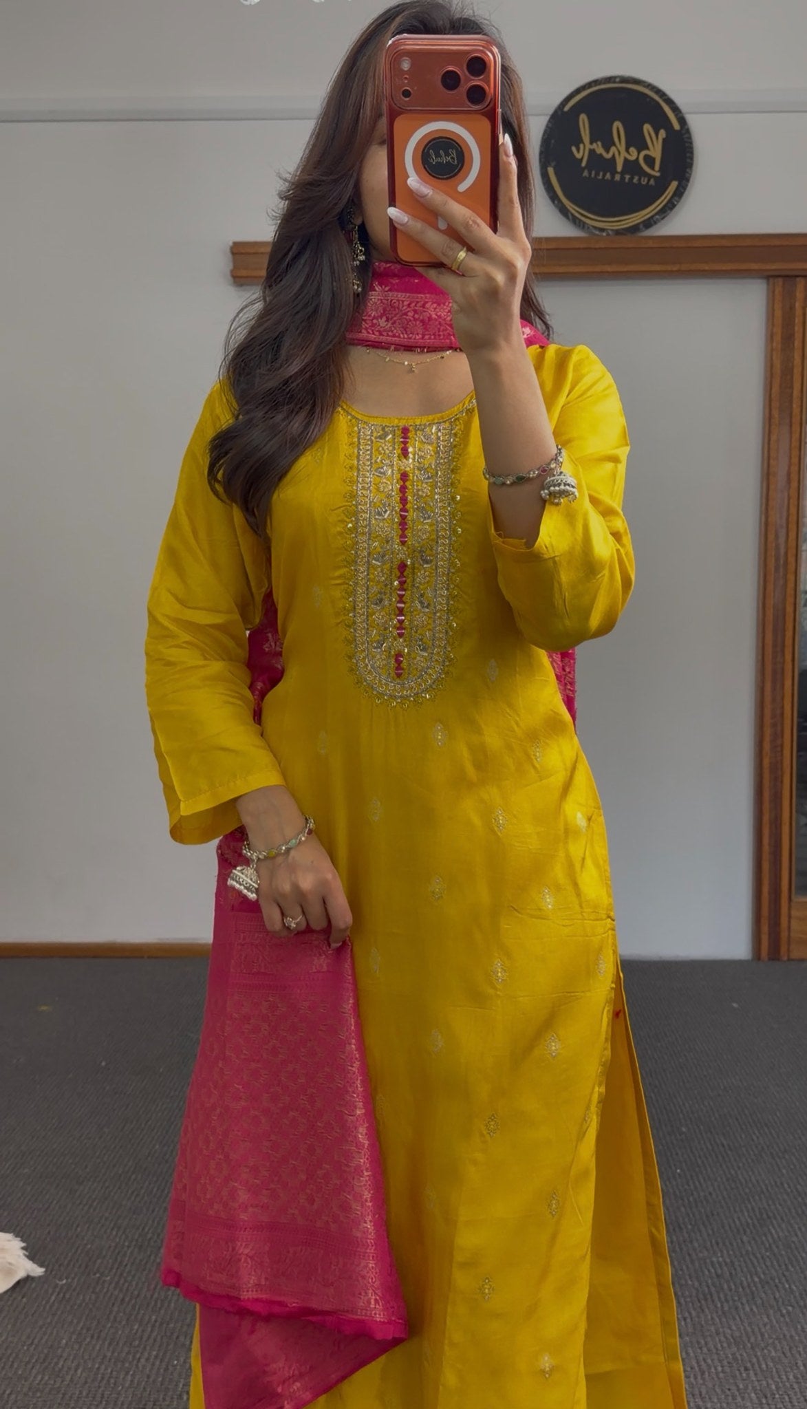 Mustard yellow kurti set with embroidered neckline paired with a fuchsia pink woven floral dupatta — view 2