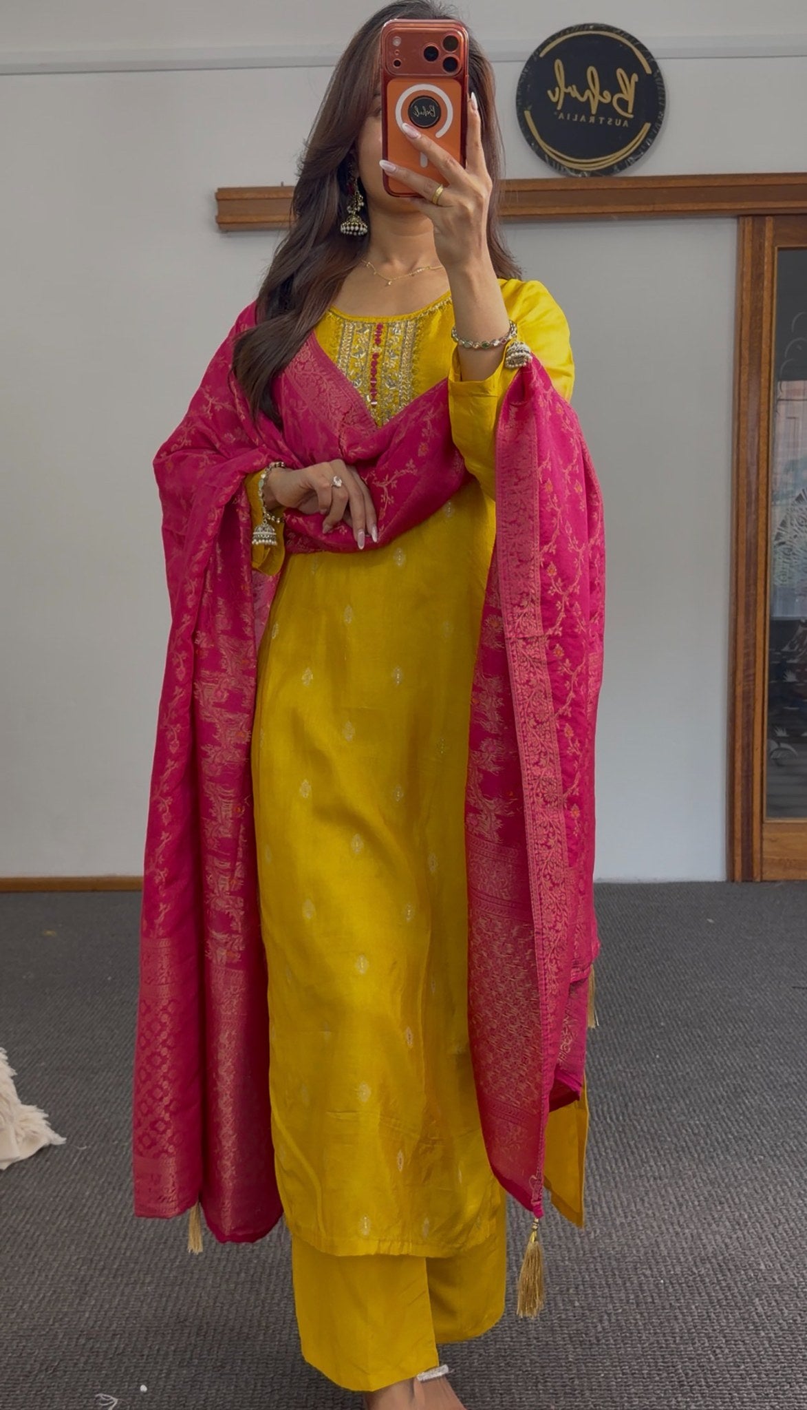 Mustard yellow kurti set with embroidered neckline paired with a fuchsia pink woven floral dupatta — view 3