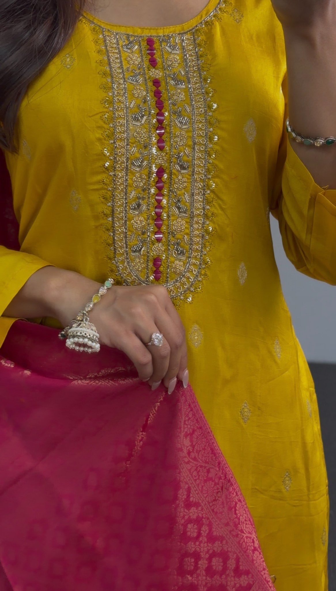 Mustard yellow kurti set with embroidered neckline paired with a fuchsia pink woven floral dupatta — view 4