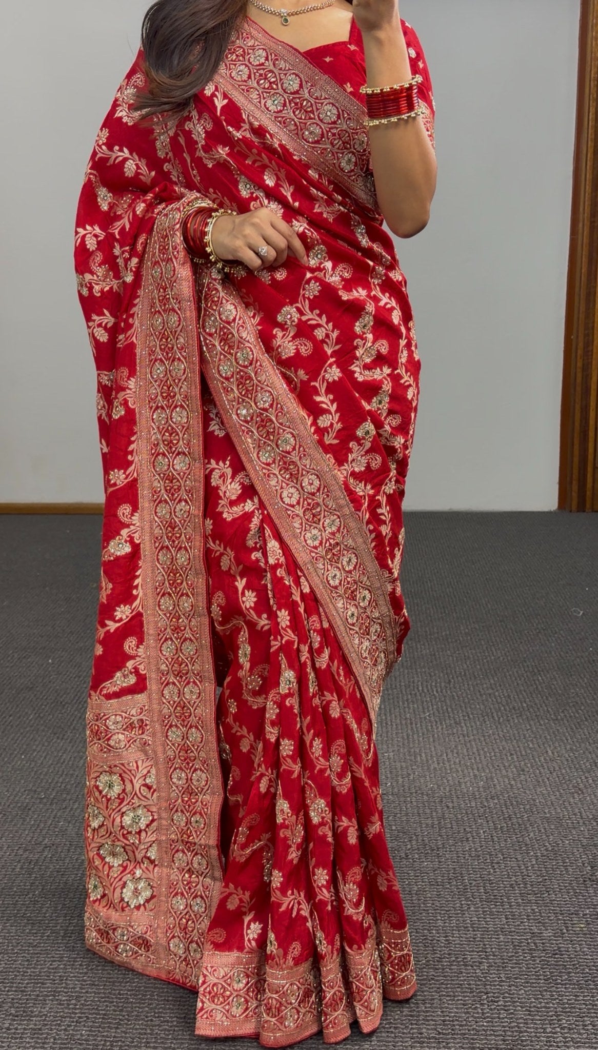 Red Khaddi georgette saree with gold zari embroidered border and sequin detailing draped with matching red blouse — view 2