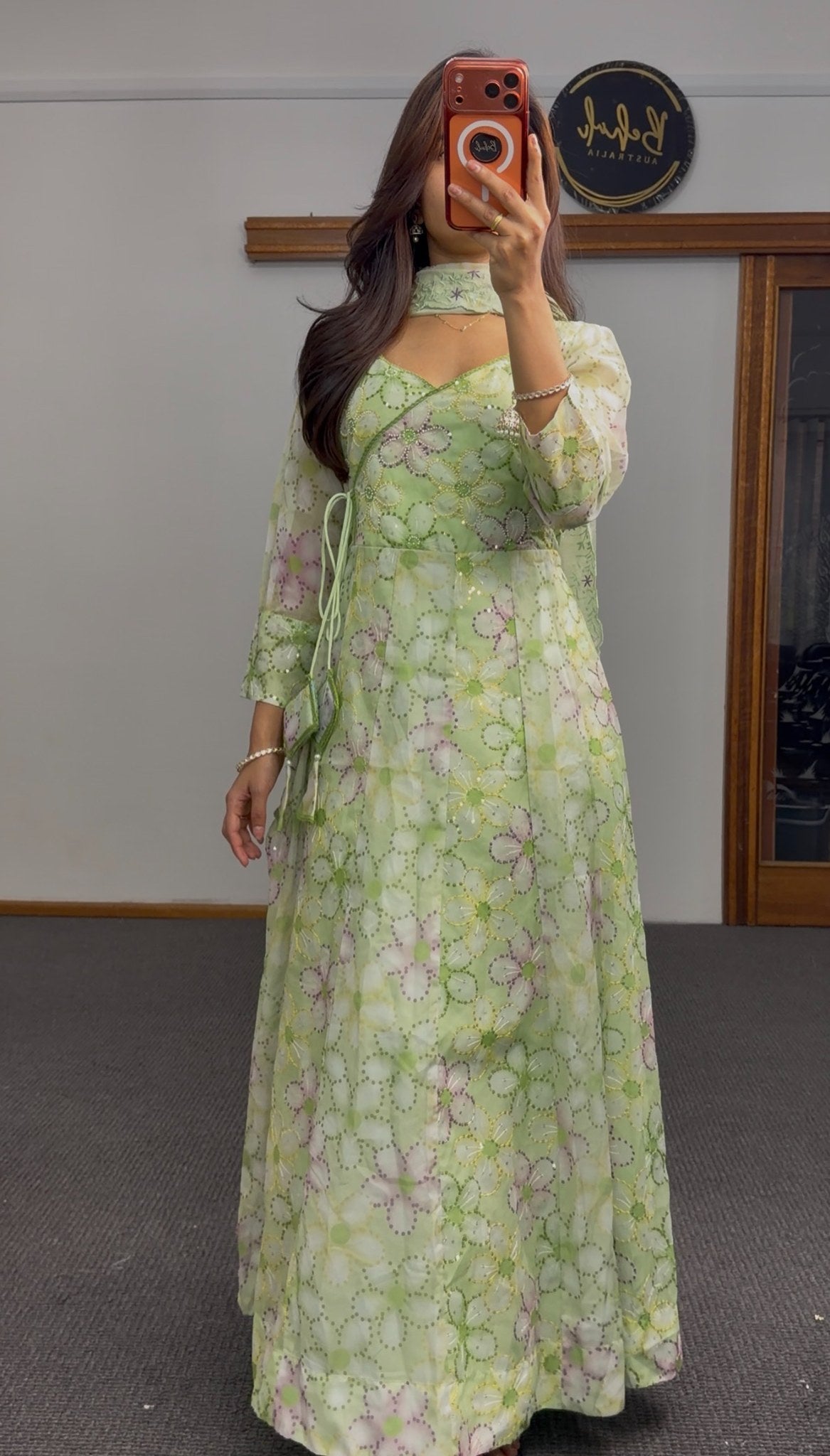 Pastel green floral print Anarkali gown with sequin embroidery, mandarin collar and tie-up waist detail by Behuli Australia