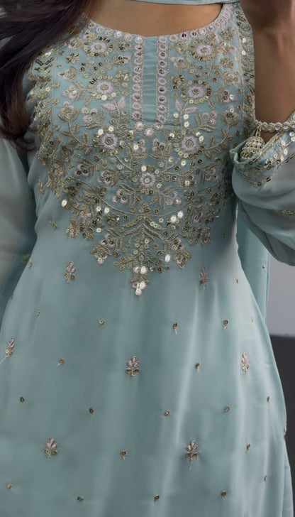 Ice blue palazzo suit set with heavy sequin floral embroidery on bodice and hem, matching embellished dupatta — Behuli — view 2