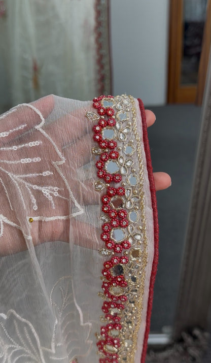 Ivory organza saree with floral embroidery, maroon stone-work border and red embroidered blouse — Behuli Australia — view 5