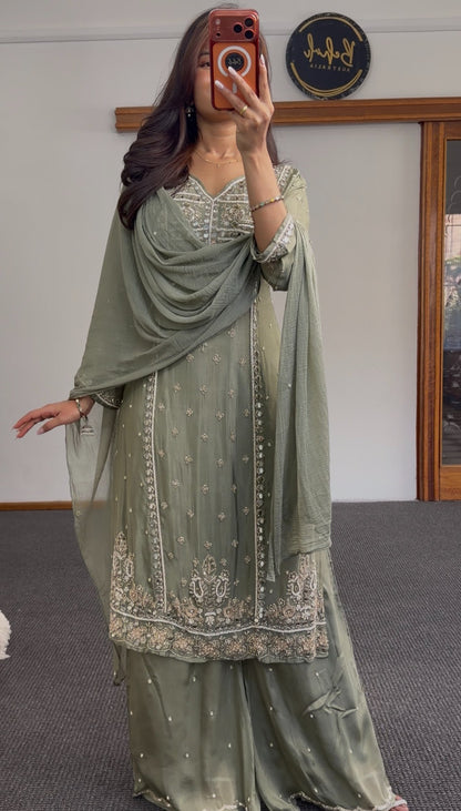 Sage green palazzo suit set with floral paisley embellishment on yoke and hem, full sleeves and matching dupatta — Behuli — view 4