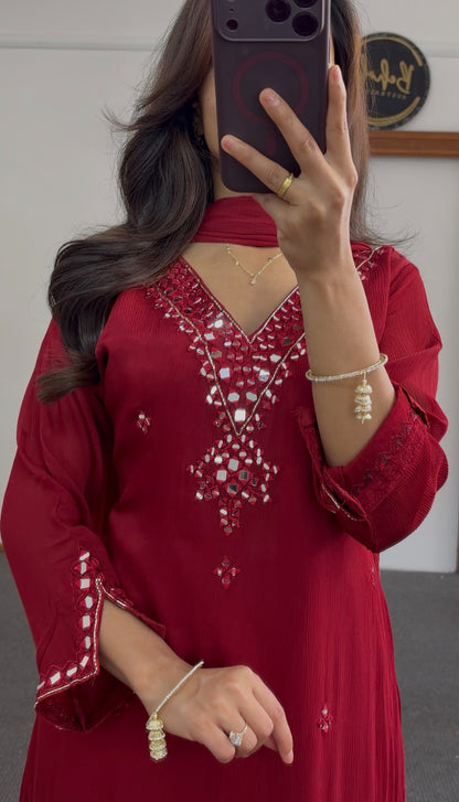 Maroon palazzo suit set with mirror work embroidery, scalloped hemline and matching dupatta worn by a model — view 4