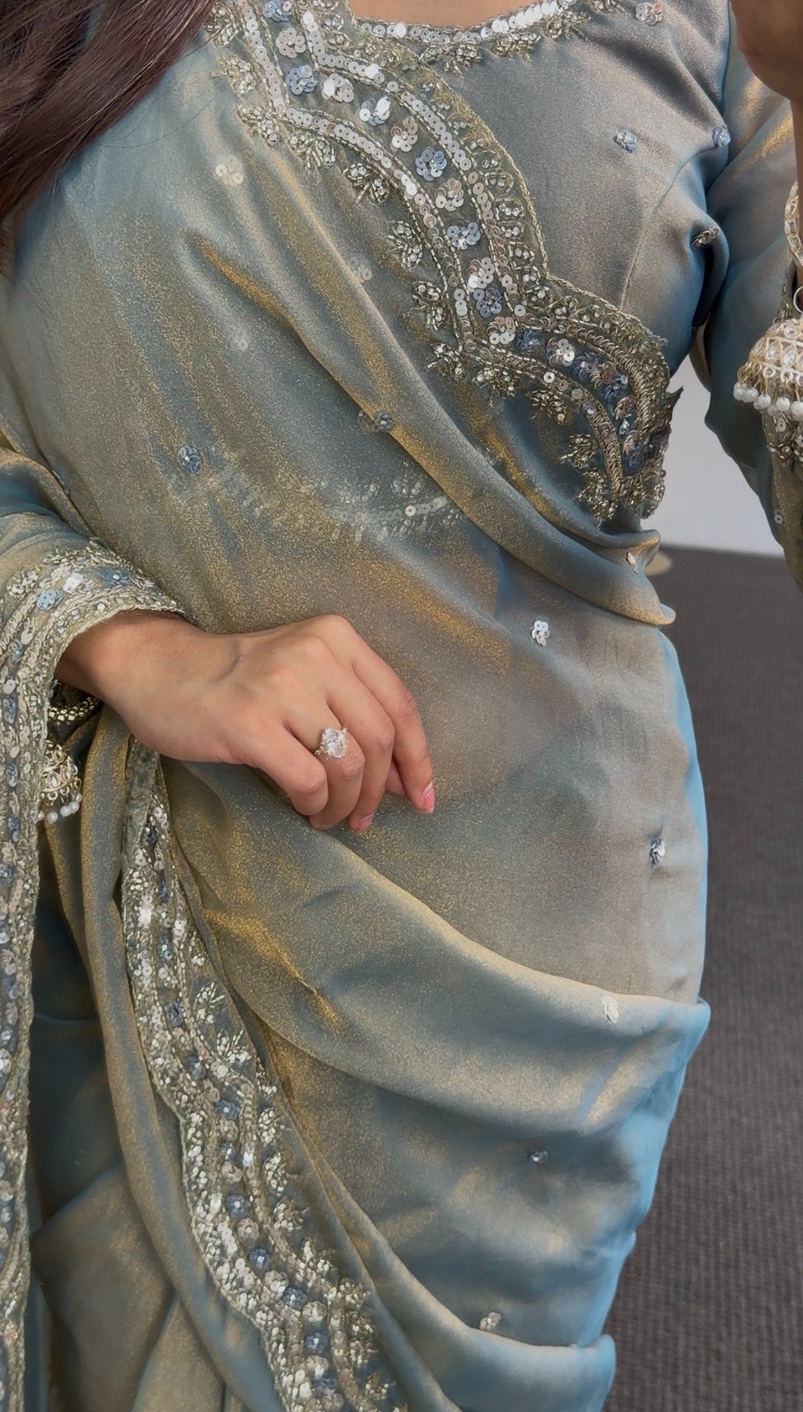 Sage grey saree with sequin and stone embroidered border draped elegantly, styled with matching blouse — Behuli Australia — view 4