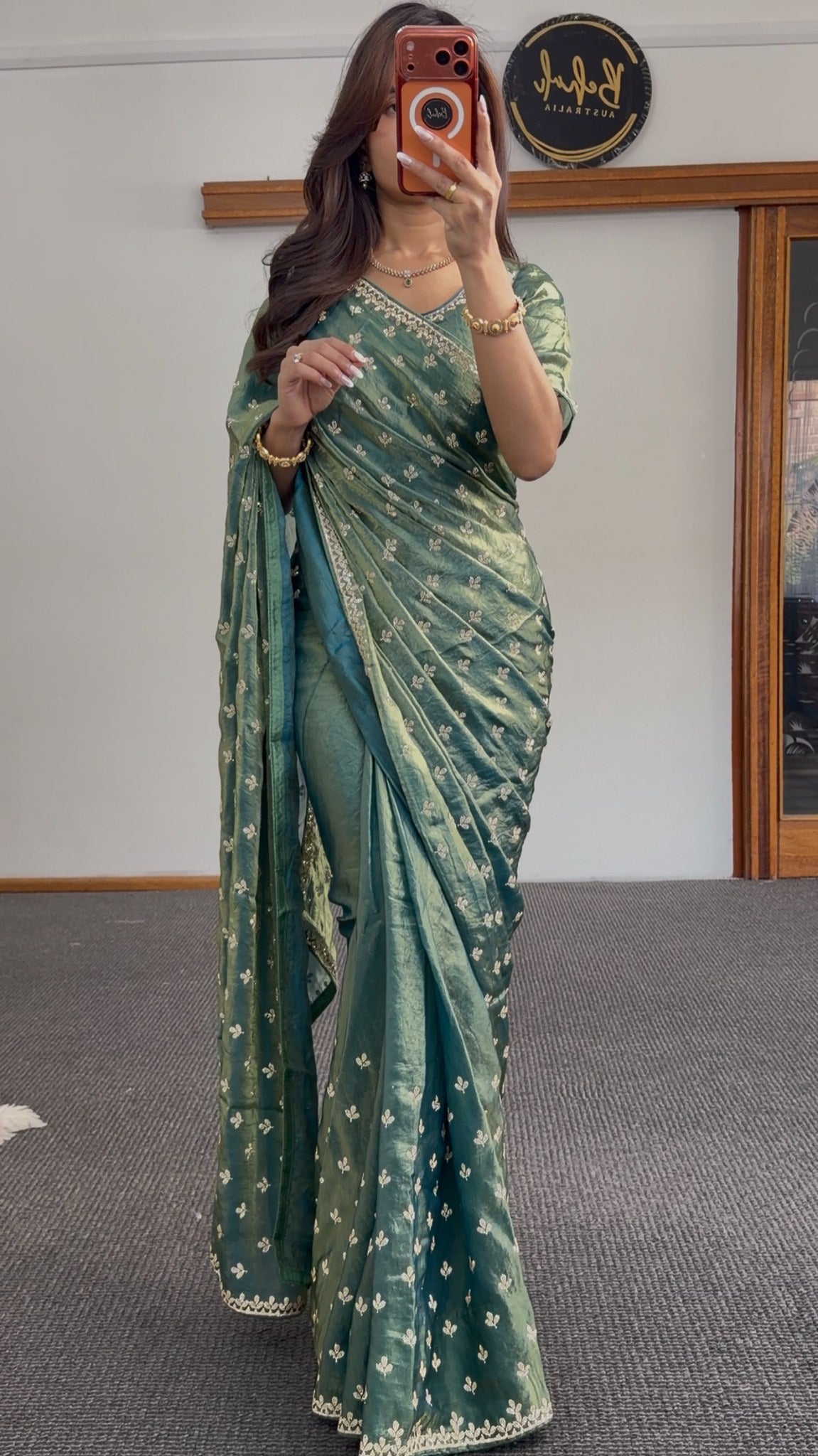 Sage green saree with Sworski crystal detailing and gold leaf motif embroidery, draped with matching pallu — Behuli Australia