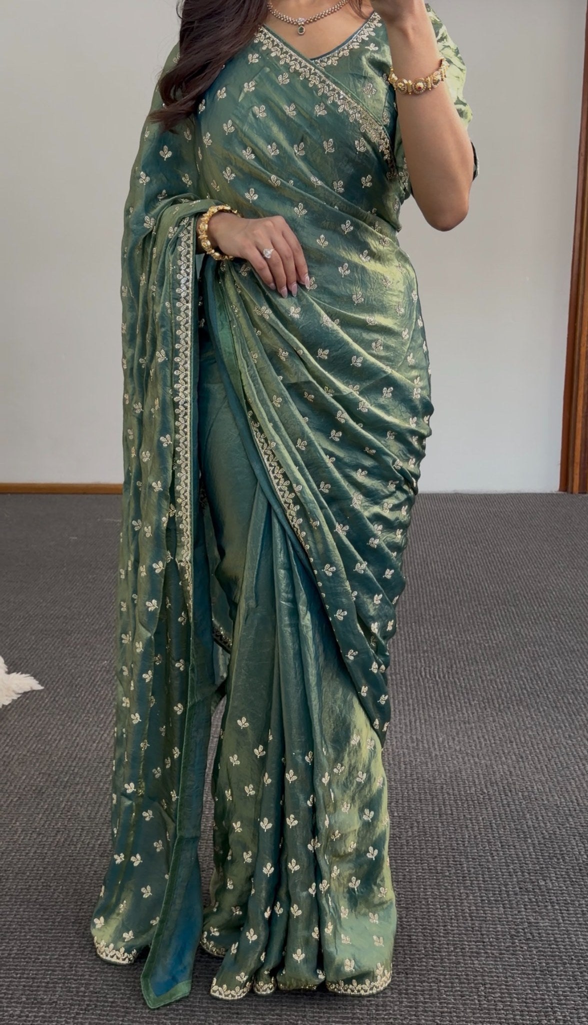 Sage green saree with Sworski crystal detailing and gold leaf motif embroidery, draped with matching pallu — Behuli Australia — view 2