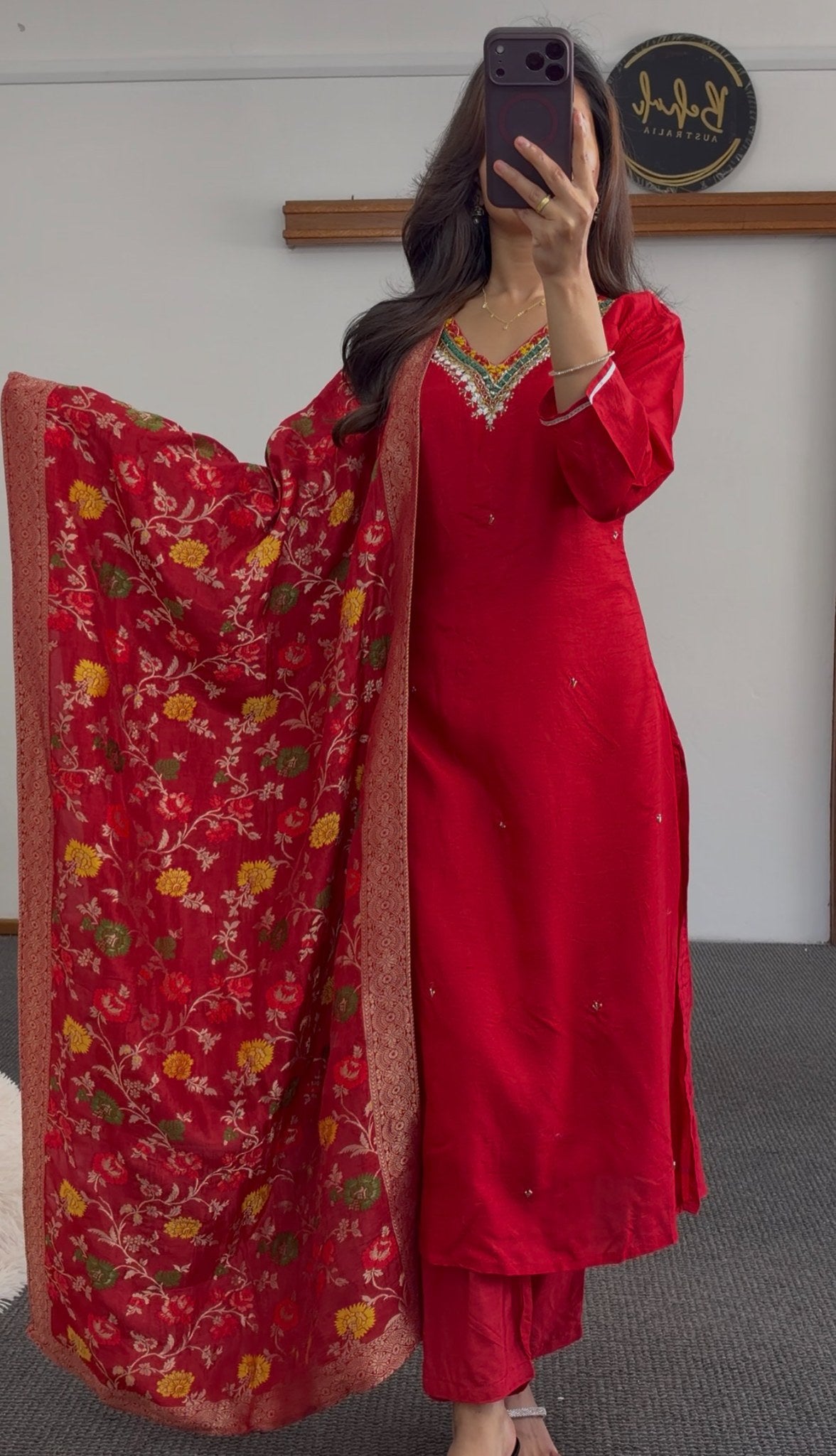 Red kurti set with sequin embroidered neckline paired with a red and gold floral Banarasi-style dupatta