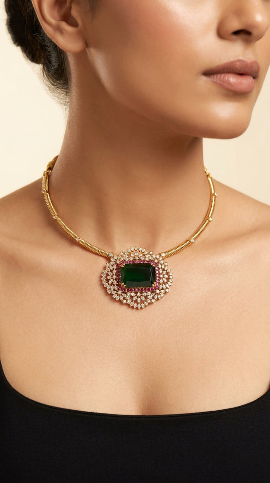 Emerald green rectangular stone choker necklace with white crystal halo, pink accent border and gold-tone rigid collar chain — view 2