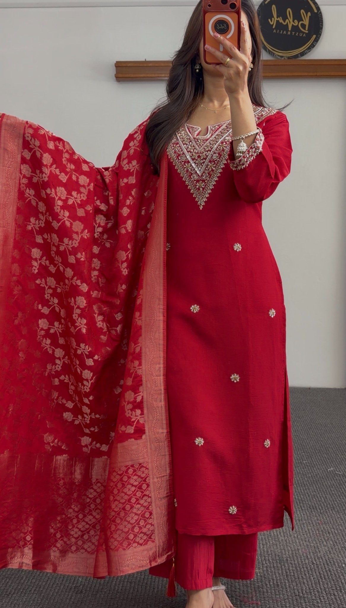 Red kurti set with gold embroidery at neckline, floral motifs, and matching woven red dupatta by Behuli Australia