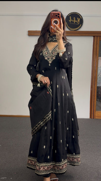 Black Anarkali suit set with floral embroidered neckline, gold buti motifs, embroidered hem border and matching dupatta — — view 2