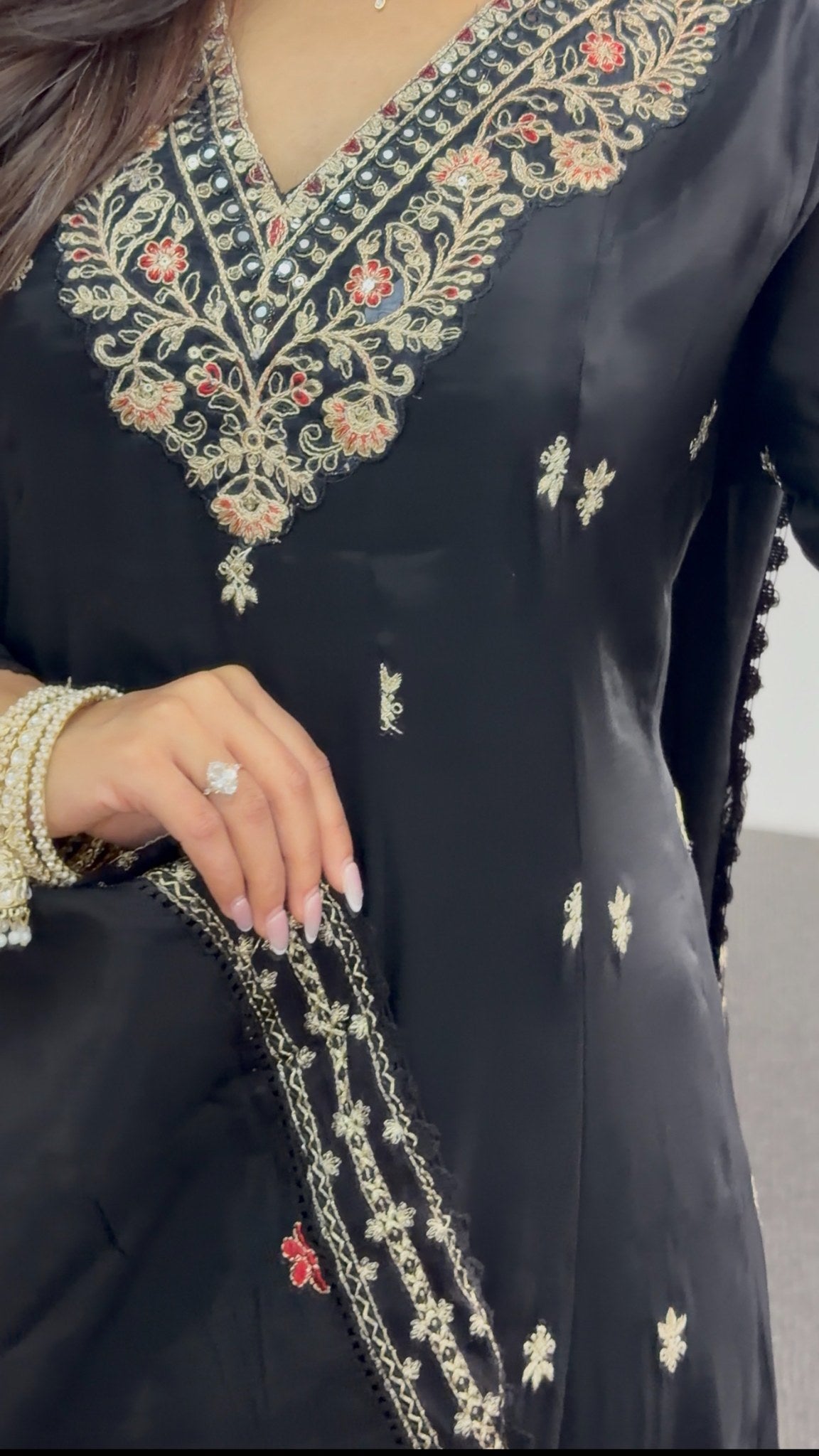 Black Anarkali suit set with floral embroidered neckline, gold buti motifs, embroidered hem border and matching dupatta — — view 6