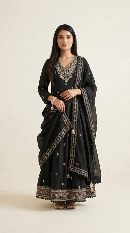 Black Anarkali suit set with floral embroidered neckline, gold buti motifs, embroidered hem border and matching dupatta — — view 7