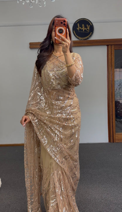 Gold net saree with intricate sequin embroidery in geometric patterns, draped elegantly — Behuli Australia — view 3