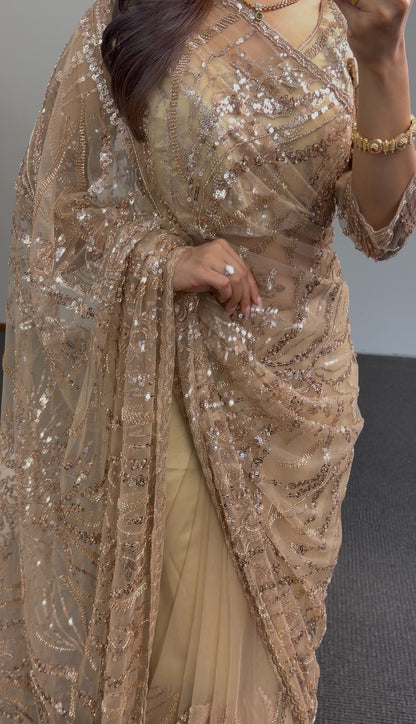 Gold net saree with intricate sequin embroidery in geometric patterns, draped elegantly — Behuli Australia — view 4