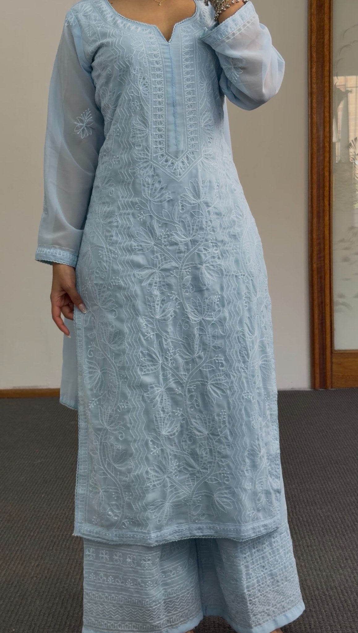Sky blue palazzo kurti set with allover white floral embroidery, geometric yoke panel, matching dupatta and wide-leg pants — — view 4