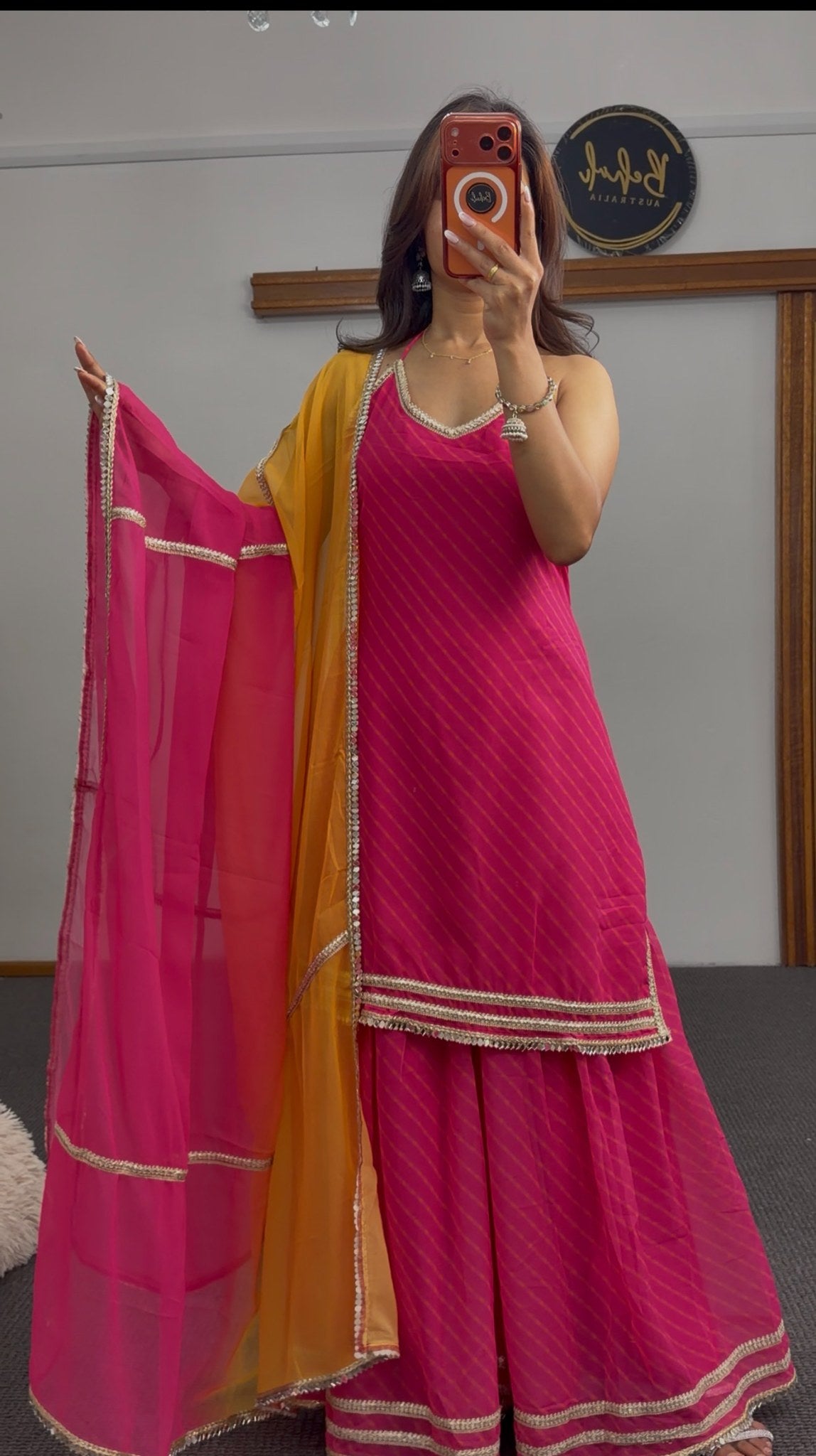 Fuchsia sharara set with gold zari hem trim, diagonal stripe pattern and mustard-fuchsia dupatta — Behuli Australia