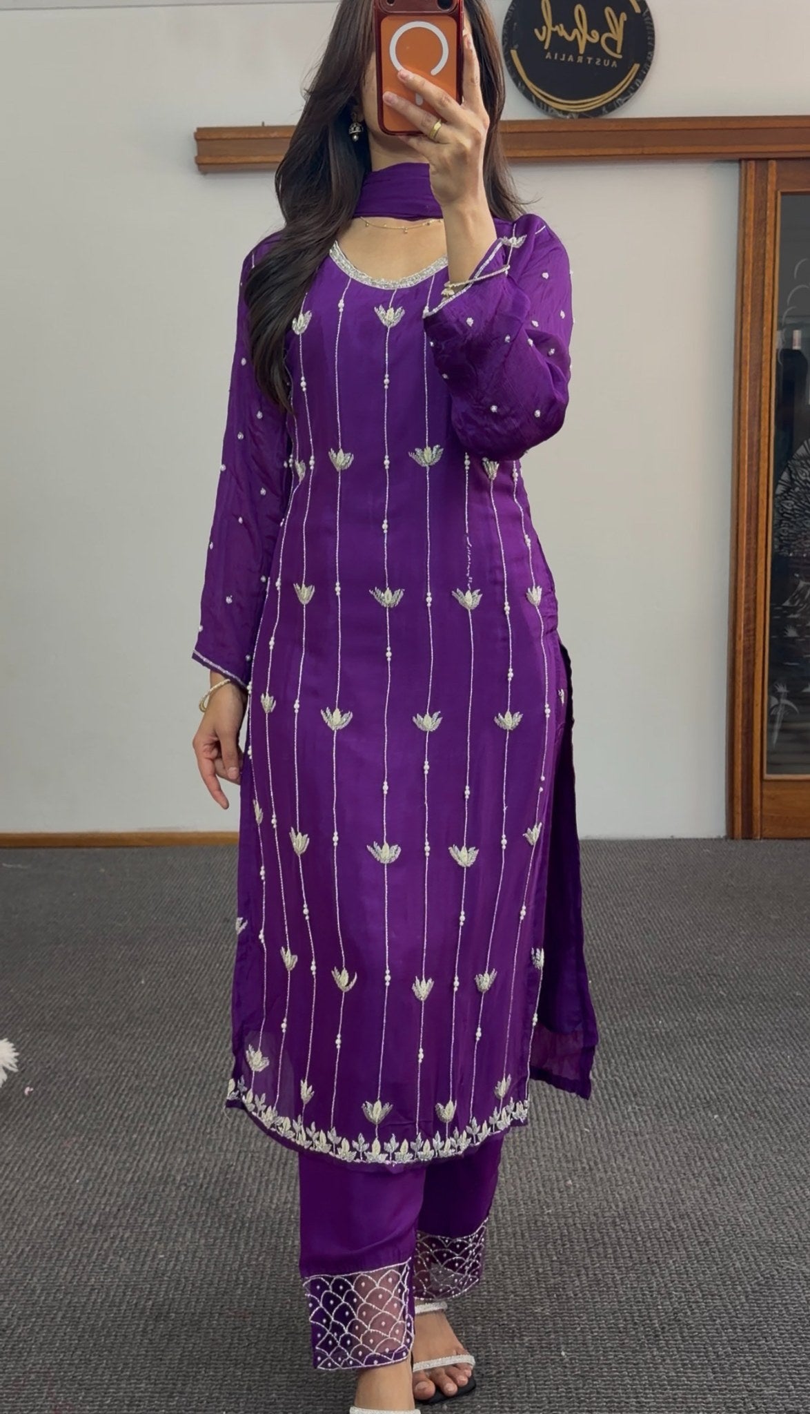 Purple kurti set with white floral embroidery, matching dupatta and embellished pants draped on model — view 2