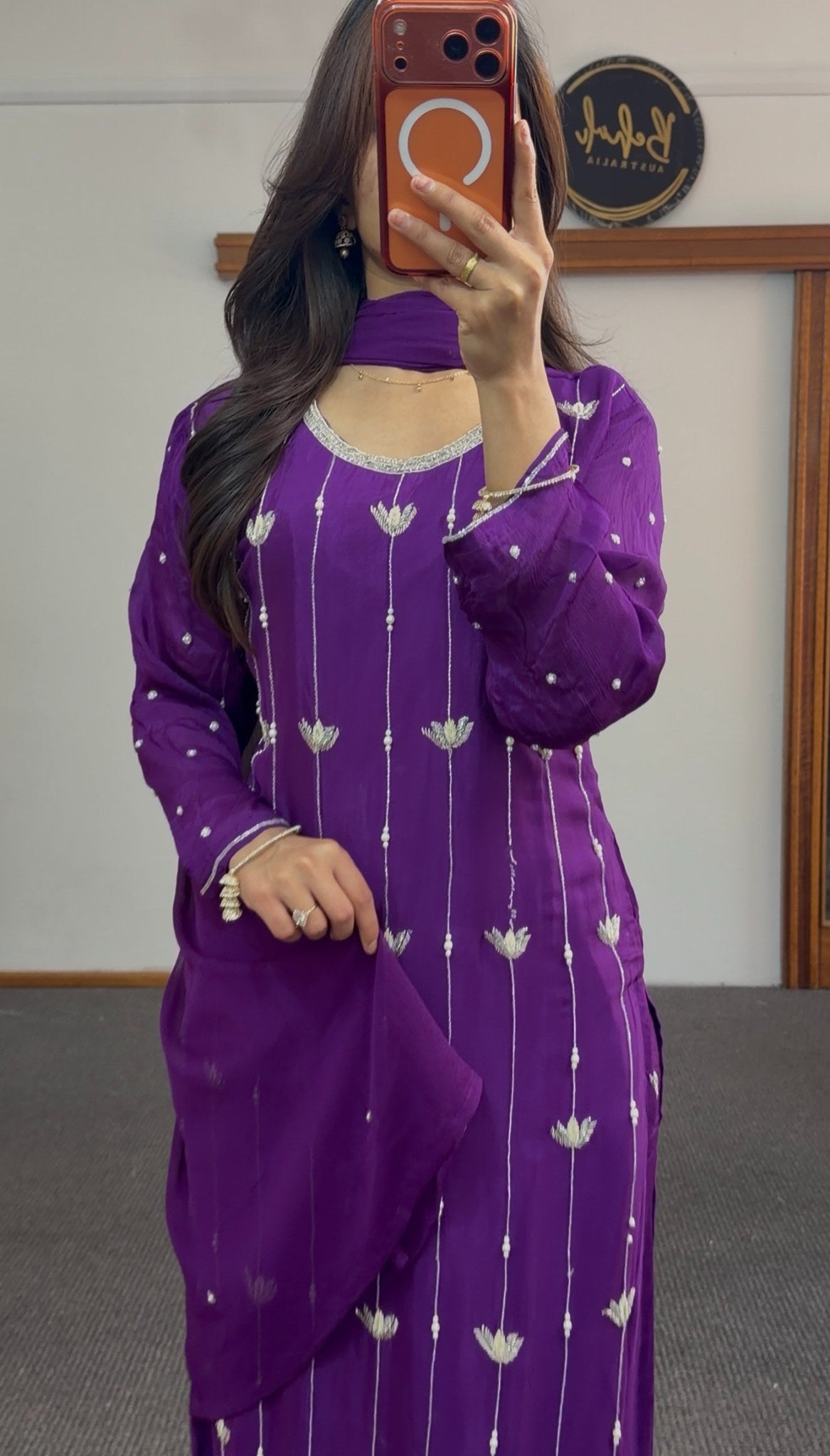 Purple kurti set with white floral embroidery, matching dupatta and embellished pants draped on model — view 3