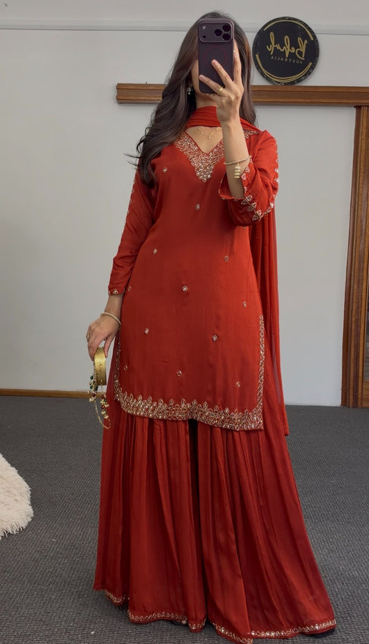Rust red palazzo suit set with gold kundan embroidery, sequin detailing, and matching flowing dupatta — Behuli Australia