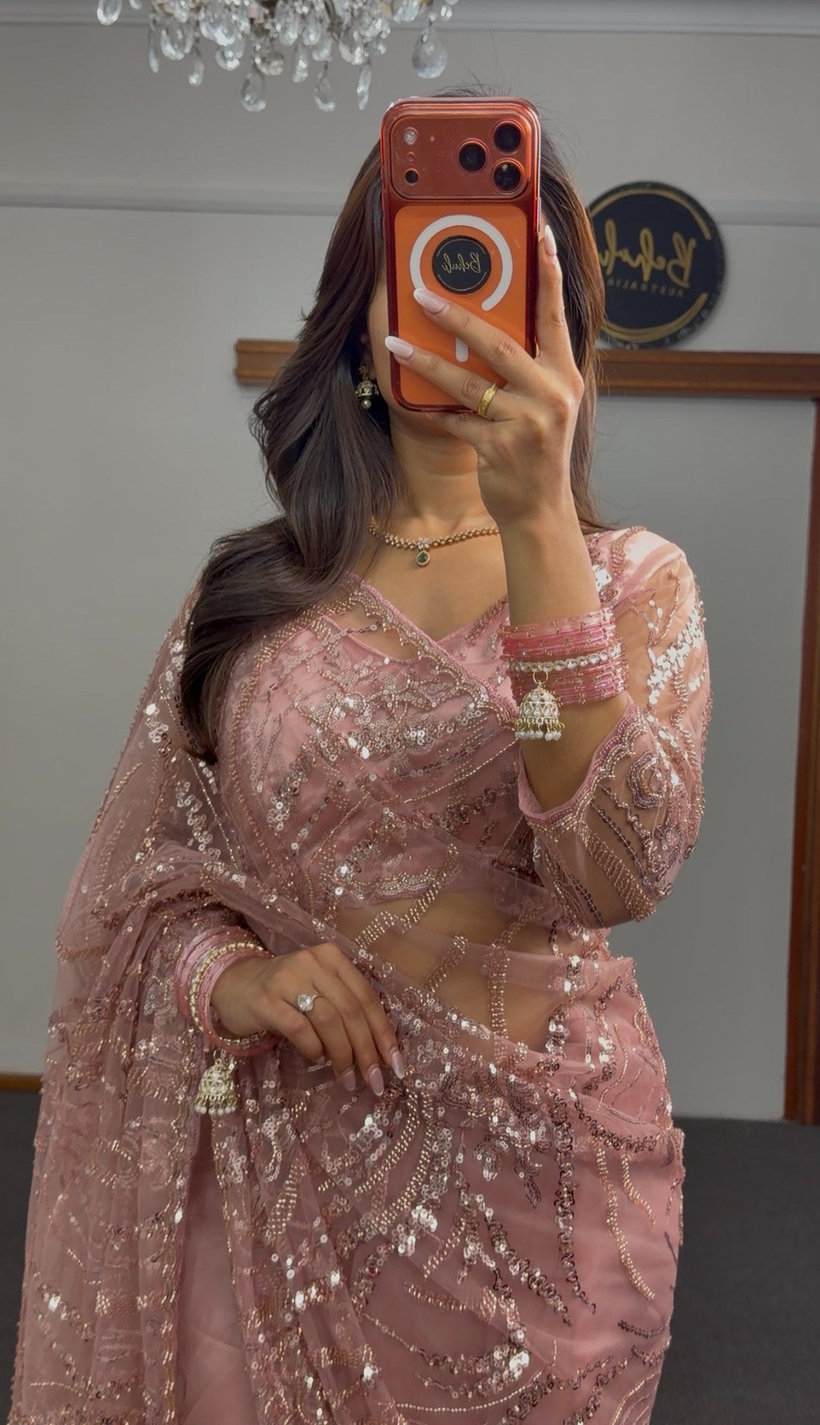 Mauve pink net saree with sequin and zari embroidery draped elegantly — Behuli Australia festive ethnic wear — view 10