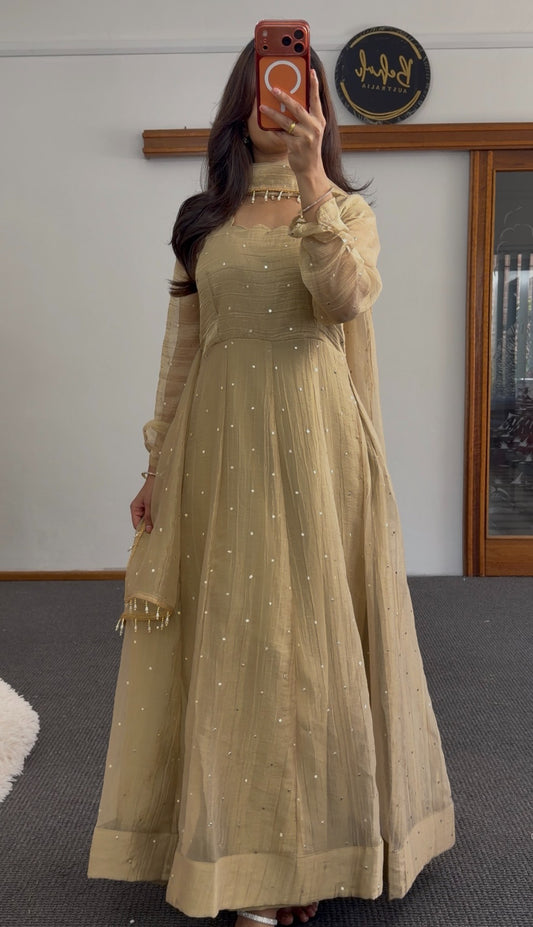 Golden beige Anarkali with scattered sequin detailing, scalloped neckline and sheer beaded dupatta draped to the side — view 2