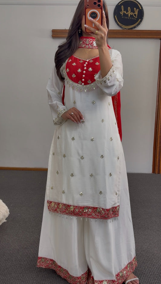 Ivory and red palazzo suit set with gold zari embroidery, red embroidered border trim and matching red dupatta — Behuli — view 2