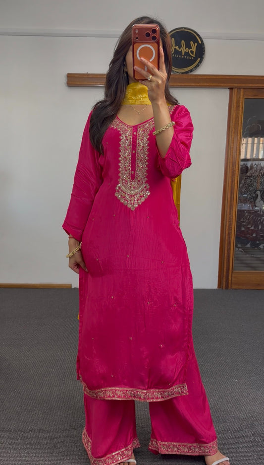 Fuchsia crepe silk kurti set with gold zari embroidery at neckline, matching trousers and mustard floral dupatta — Behuli — view 2