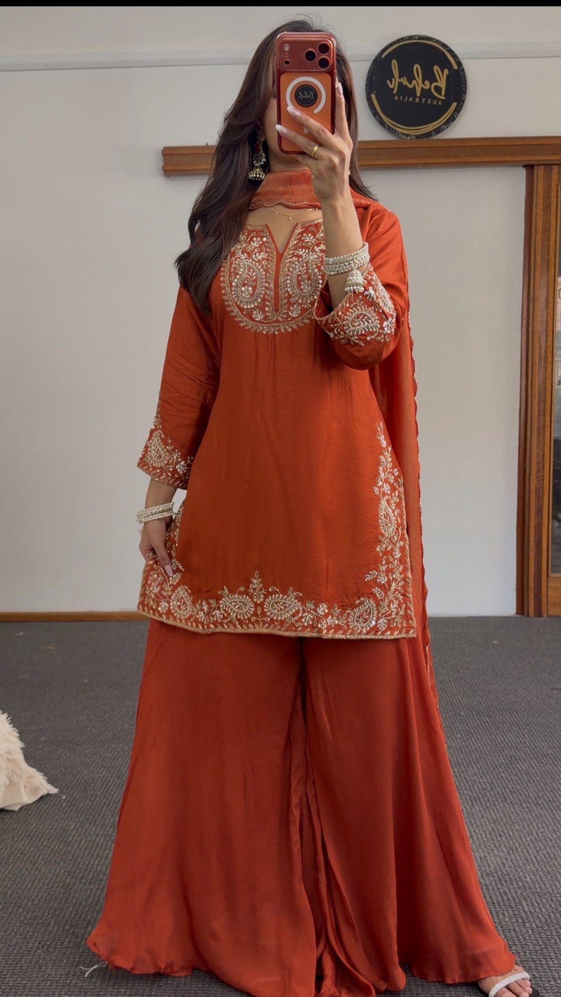 Rust orange palazzo suit set with gold embroidery at neckline, cuffs and hem border, styled with matching dupatta — Behuli — view 2