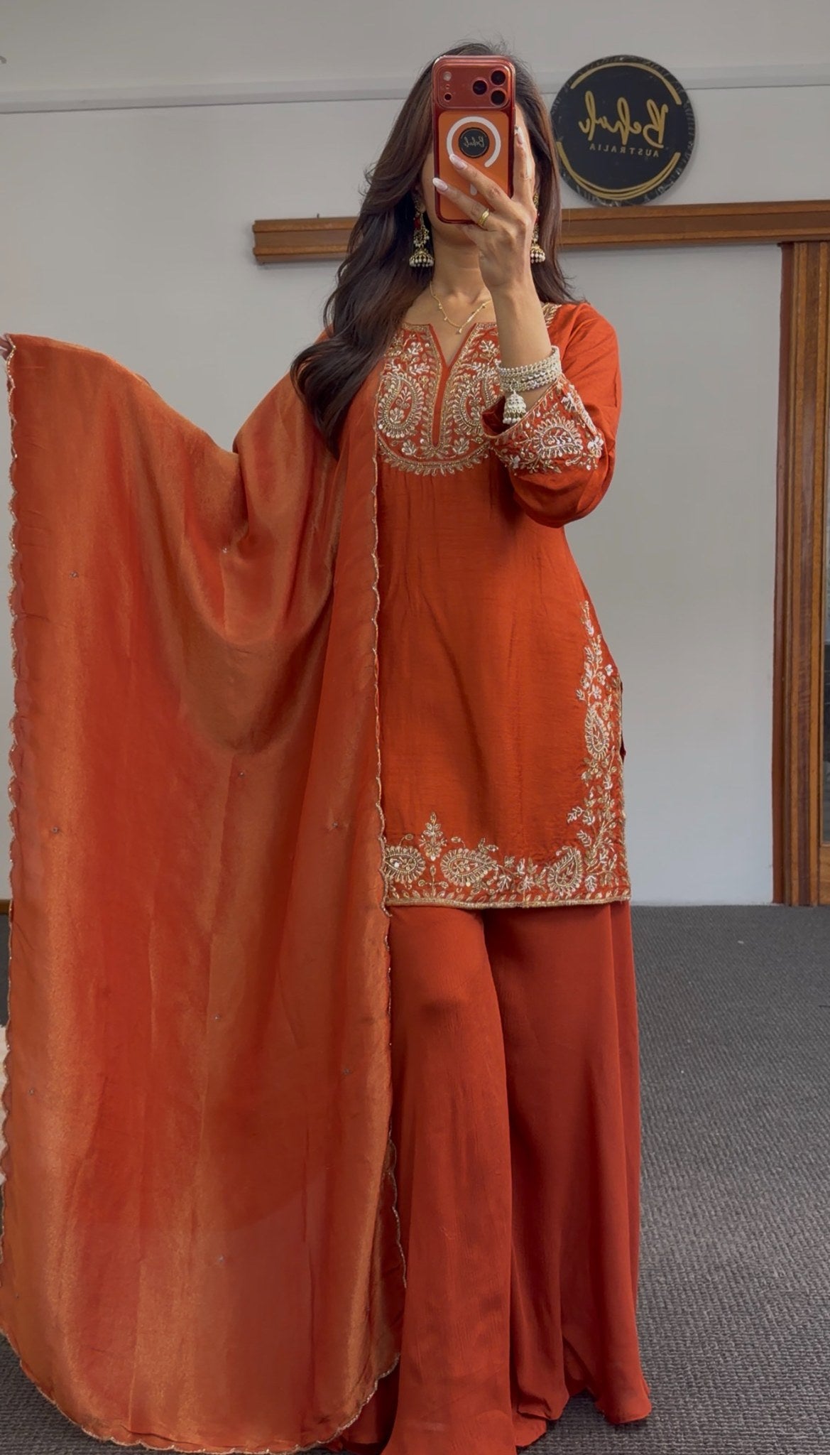 Rust orange palazzo suit set with gold embroidery at neckline, cuffs and hem border, styled with matching dupatta — Behuli — view 3