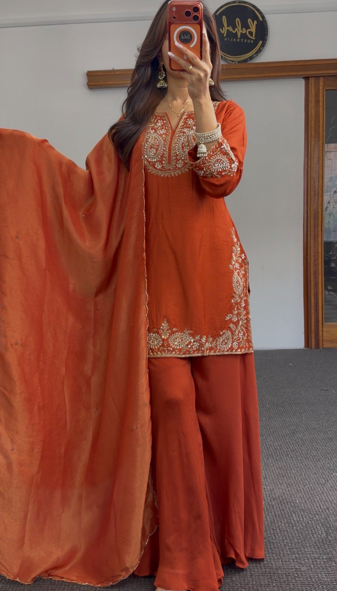 Rust orange palazzo suit set with gold embroidery at neckline, cuffs and hem border, styled with matching dupatta — Behuli — view 5