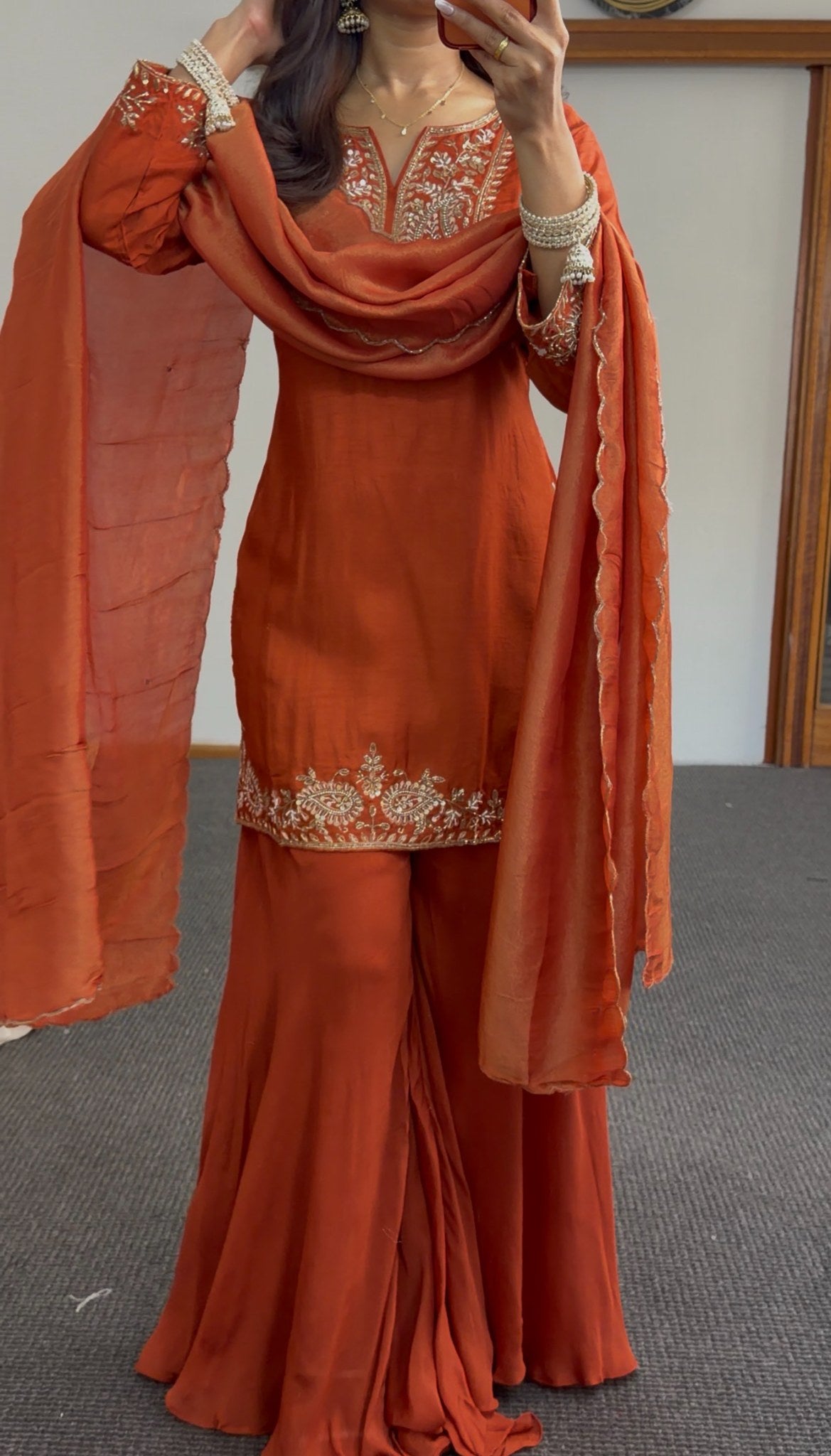 Rust orange palazzo suit set with gold embroidery at neckline, cuffs and hem border, styled with matching dupatta — Behuli — view 6