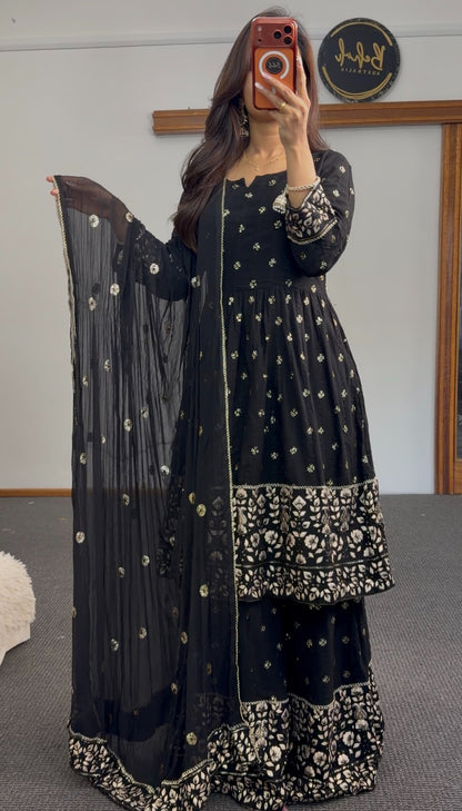 Black and gold Anarkali sharara set with zari floral embroidery, tiered embroidered hem and matching sheer dupatta — Behuli — view 2