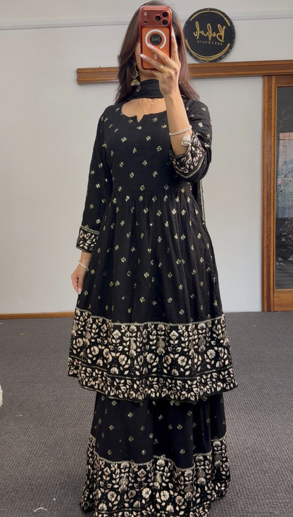 Black and gold Anarkali sharara set with zari floral embroidery, tiered embroidered hem and matching sheer dupatta — Behuli — view 3