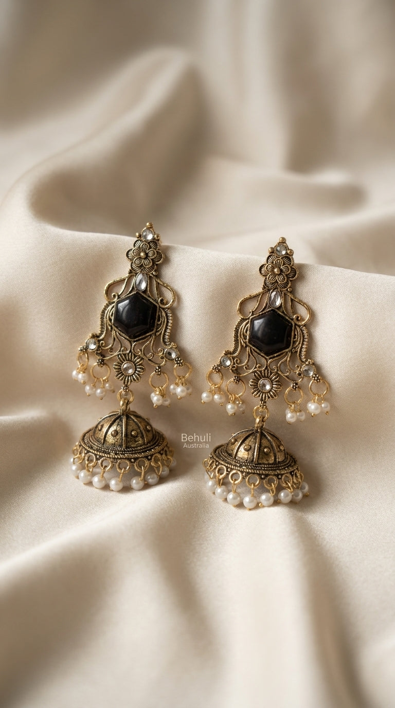 Antique gold oxidised jhumka earrings with black hexagonal stone, filigree frame, and pearl-finish bead drops — Behuli — view 2