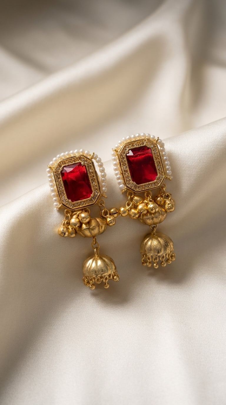 Gold choker necklace with pearl beadwork, ruby red and emerald green stone accents displayed on black bust — view 2
