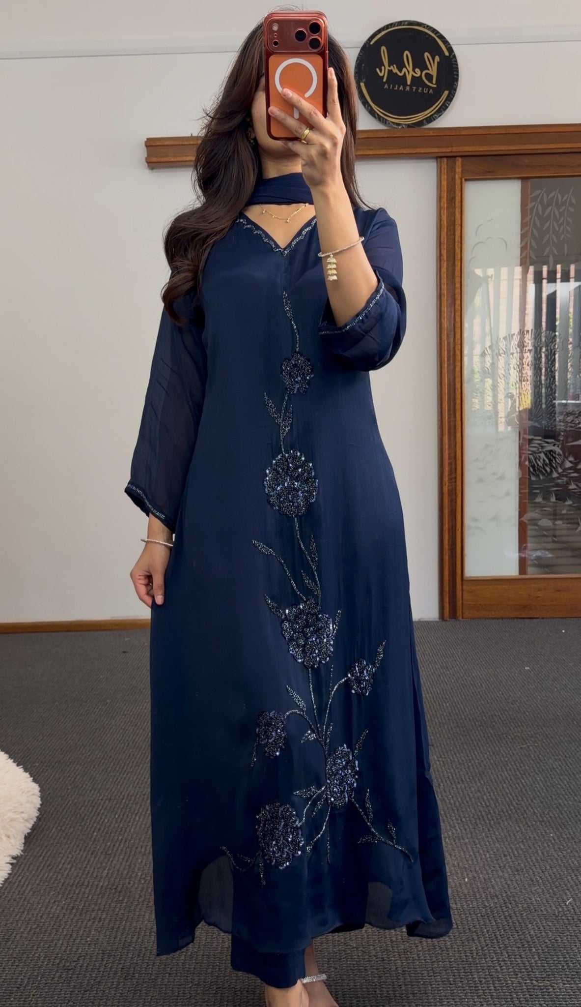 Navy blue A-line kurti set with floral sequin embroidery cascading down the front and matching draped scarf