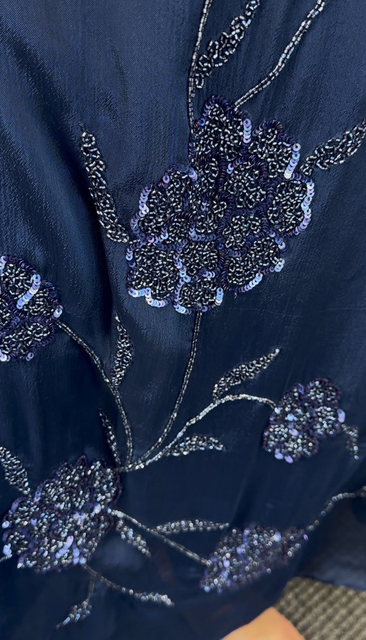 Navy blue A-line kurti set with floral sequin embroidery cascading down the front and matching draped scarf — view 3