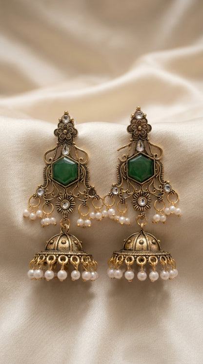 Antique gold-tone jhumka earrings with hexagonal green stone, filigree scrollwork and ivory pearl drops — Behuli Australia