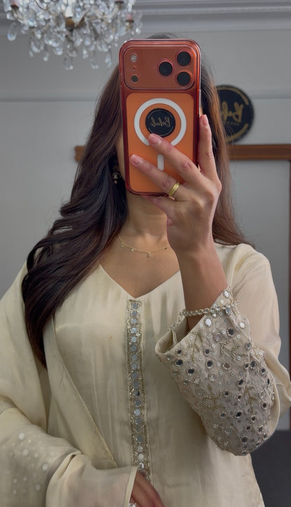 Ivory A-line kurti set with mirror work embroidered sleeves, embellished placket, and matching flowing dupatta — view 2