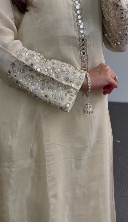 Ivory A-line kurti set with mirror work embroidered sleeves, embellished placket, and matching flowing dupatta — view 5