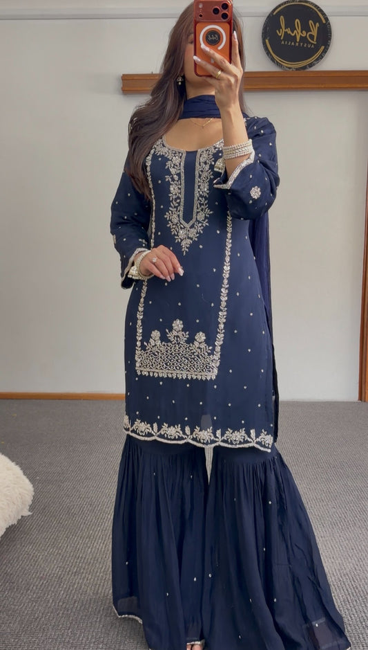 Navy blue sharara set with silver zari thread embroidery on kurta bodice and scalloped hem, matching sharara bottoms — — view 2