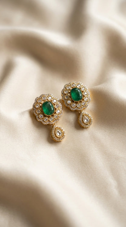 Gold-tone kundan choker and earring set with emerald green gemstone centrepieces and cascading white stone teardrop pendants — view 3