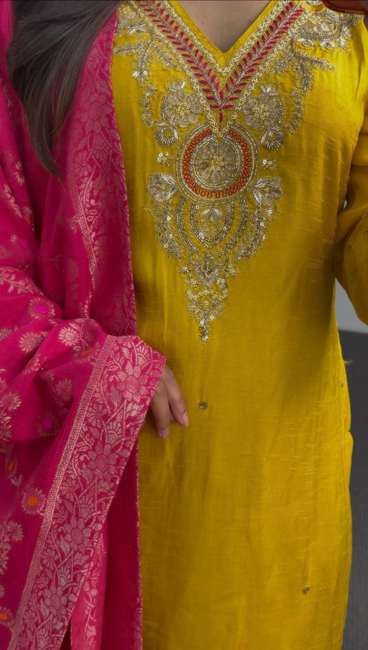 Mustard yellow kurti set with embroidered neckline paired with fuchsia pink Banarasi-style dupatta featuring gold floral — view 2