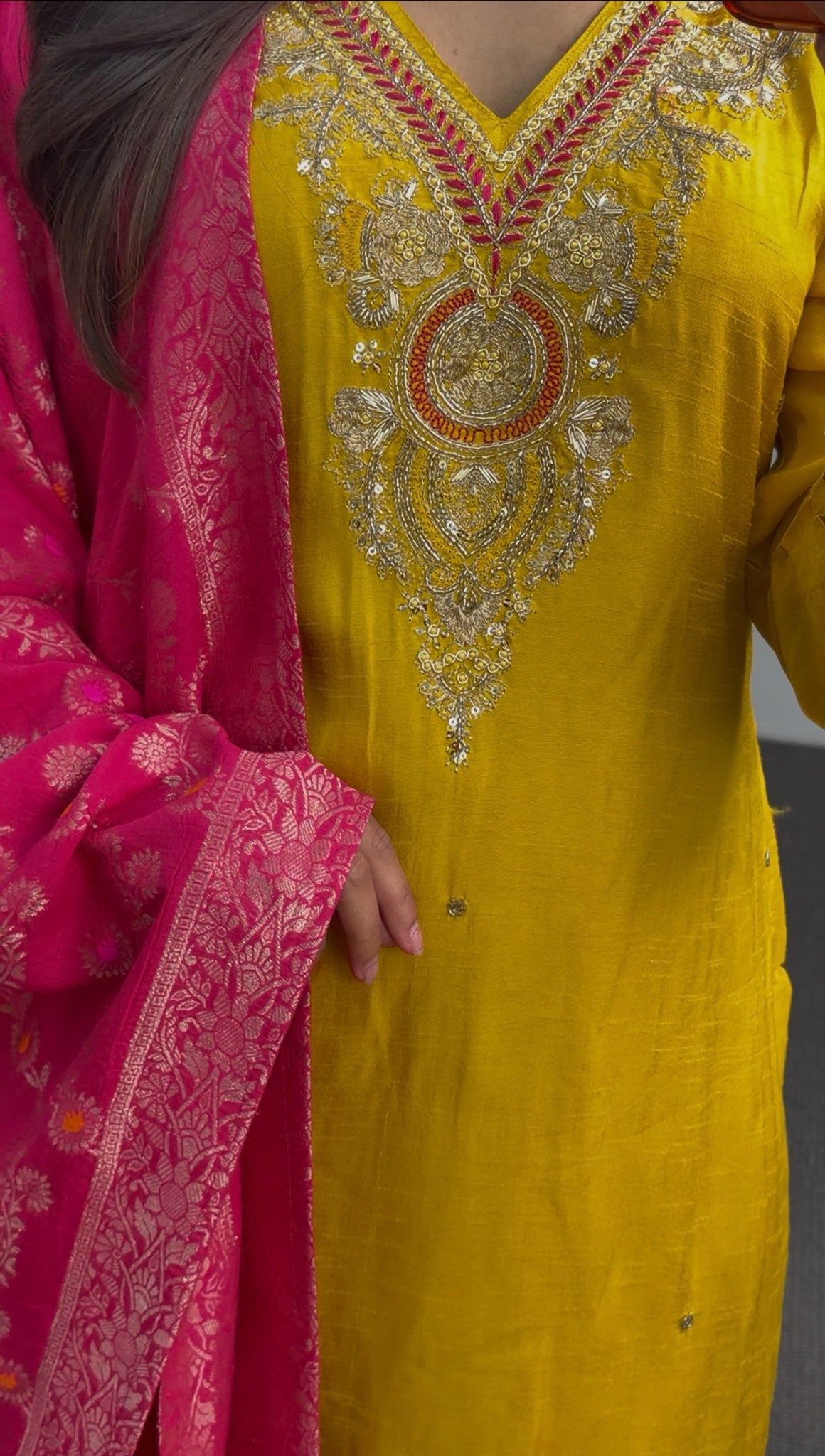Mustard yellow kurti set with embroidered neckline paired with fuchsia pink Banarasi-style dupatta featuring gold floral — view 2