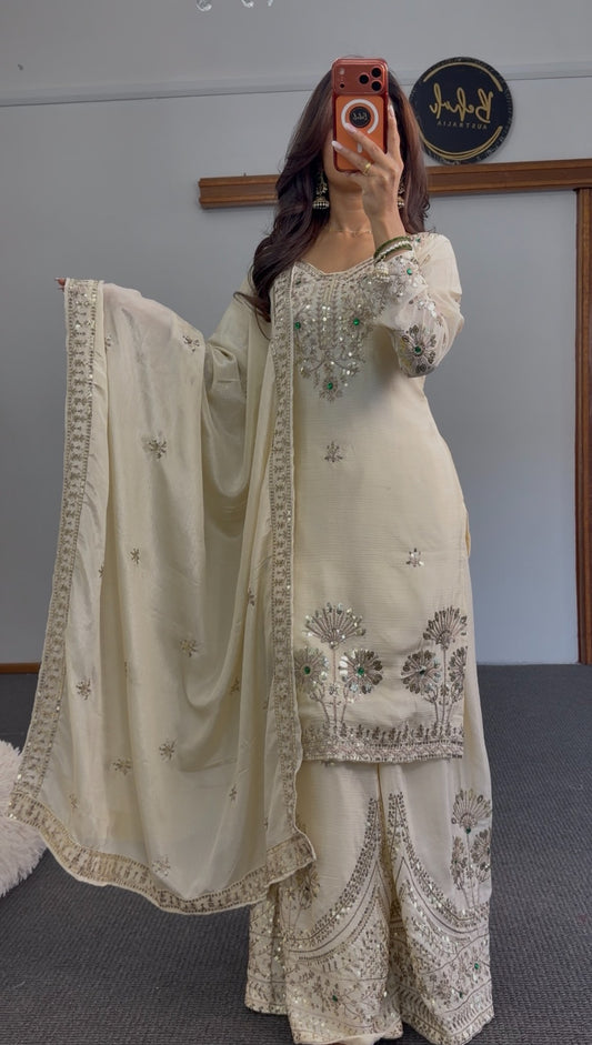 Ivory palazzo suit set with silver sequin embroidery and green stone accents, matching dupatta and wide-leg palazzo — Behuli