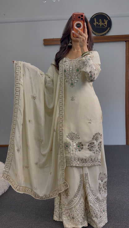 Ivory palazzo suit set with silver sequin embroidery and green stone accents, matching dupatta and wide-leg palazzo — Behuli