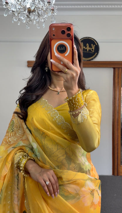 Mustard yellow floral print saree with scalloped gold sequin border, draped elegantly — Behuli Australia — view 2