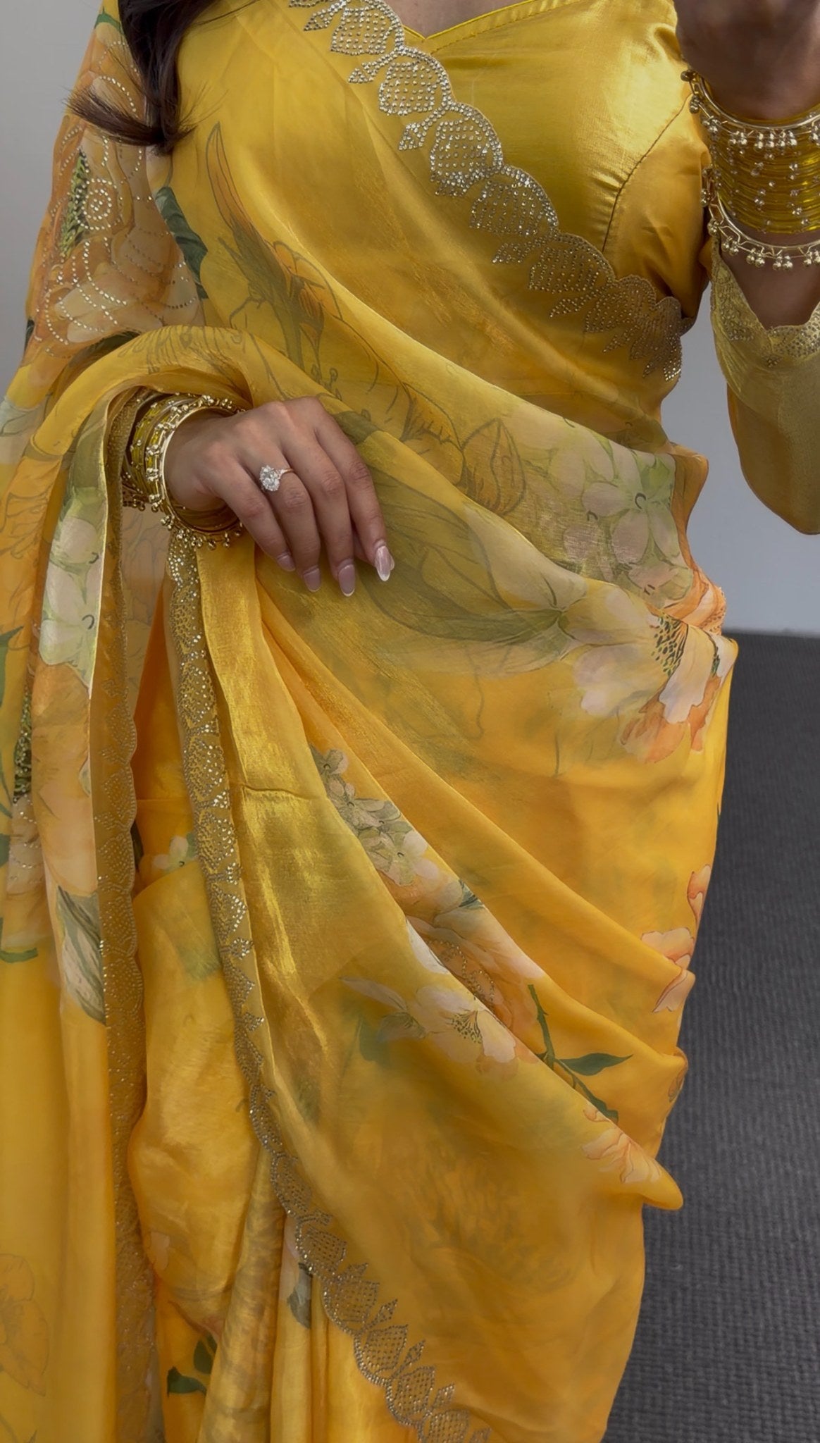 Mustard yellow floral print saree with scalloped gold sequin border, draped elegantly — Behuli Australia — view 4